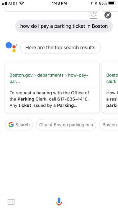 Google Assistant app on iPhone with the results of a “how do I pay a parking ticket in Boston” query, showing results only weakly related to the intended content.