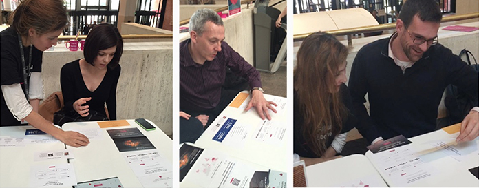Three photographs of users reacting to large paper printouts of modules.
